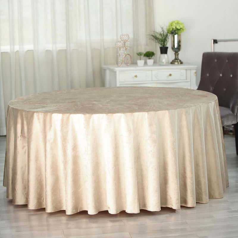 Gold round tablecloth on a decorated table