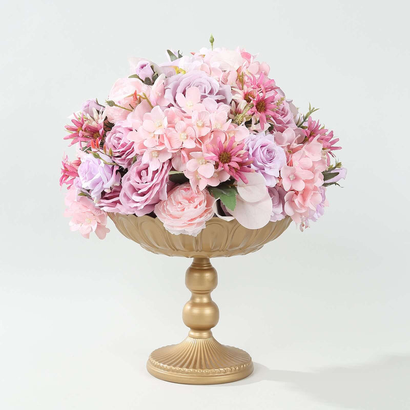 Pink floral arrangement in gold compote bowl