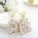 Pastel candy-filled organza bags for party favors
