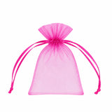 Pink organza drawstring gift pouch on white background#whtbkgd