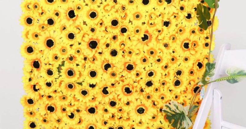 Sunflower flower wall with greenery