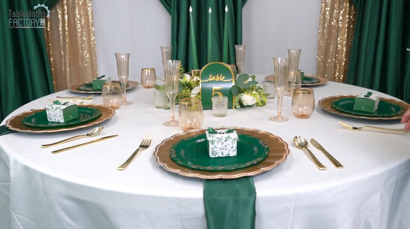 Final touches added to complete the elegant green and gold table decor.