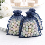 Pastel candy-filled mesh bags for party favors or events.
