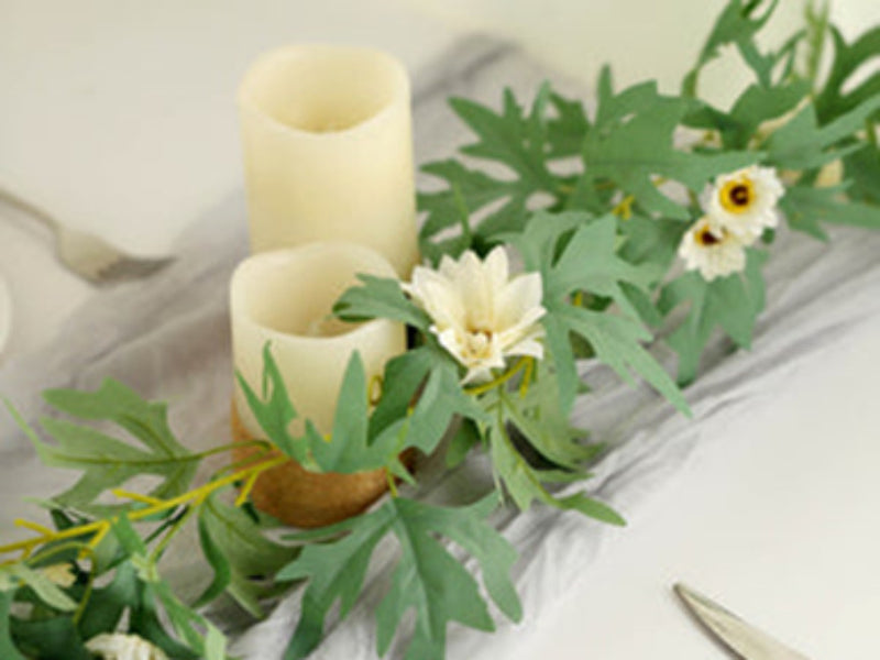 Floral table centerpiece with candles