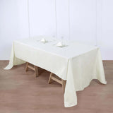 60"x126" Ivory Polyester Rectangular Tablecloth