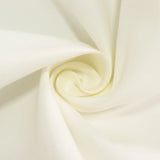White plate with gold rim on an elegant table setting. 
