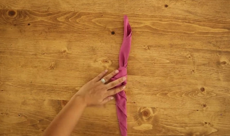 Napkin Folds for Wedding Receptions- knot napkin fold steps