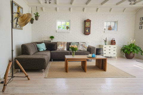 Living room with neutral couch and wooden coffee table