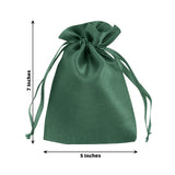 Green satin drawstring bag, 7 inches tall and 5 inches wide.