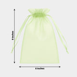 Green organza drawstring bag measuring 9x6 inches.