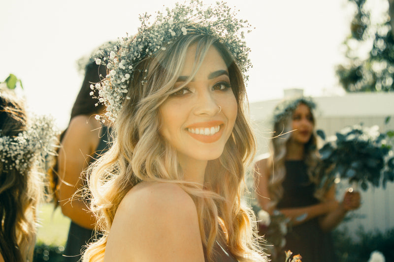 Woman smiling with a floral crown