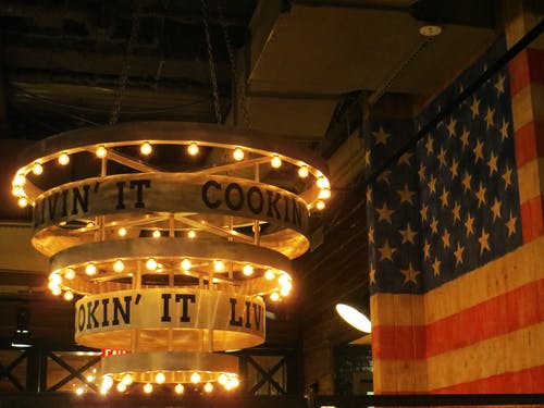 Wooden hanging light fixture with bulbs