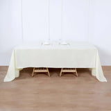 60"x126" Ivory Polyester Rectangular Tablecloth