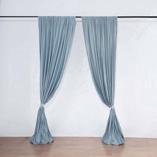 Elegant blue drapery curtains on a white backdrop for home decor.