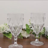 Clear vintage diamond cut plastic goblets for wine and beverages.