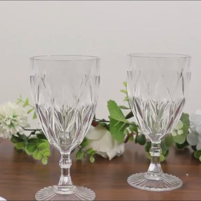 Clear vintage diamond cut plastic goblets for wine and beverages.