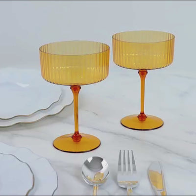 Amber gold ribbed disposable cocktail glasses with detachable stem.