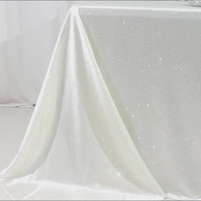 Pearl white rectangular tablecloth with rhinestone accents.
