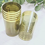 Dusty sage green plastic tumbler cups with gold rim, stylish disposable party glasses.