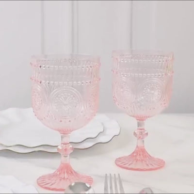 Blush embossed floral pattern wine goblets in a 12-pack, shatterproof and reusable.