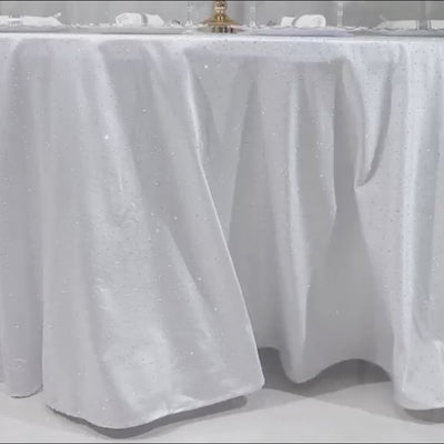 White round tablecloth with rhinestone accents, seamless and wrinkle-free.