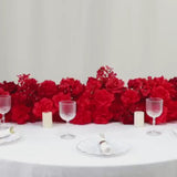 Mixed red silk flower table runner with roses, hydrangeas, and peonies.