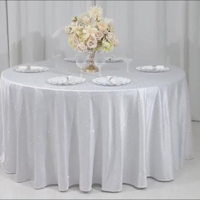 White round tablecloth with rhinestone accents, seamless and wrinkle-free.