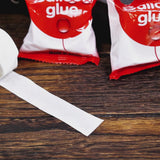 Clear balloon tape and glue dots for party decorations.