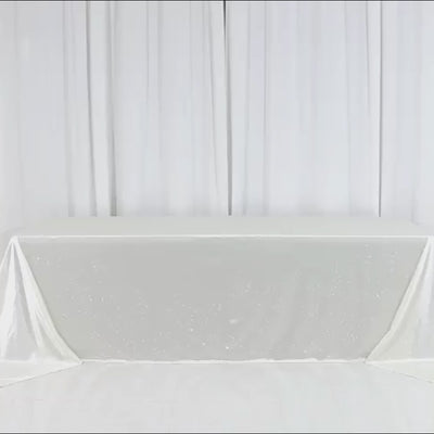 Pearl white rectangular tablecloth with rhinestone accents, wrinkle-free and stain-resistant.