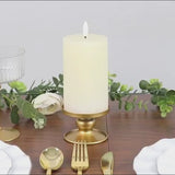 Gold metal candle holders for versatile pillar and taper candles.