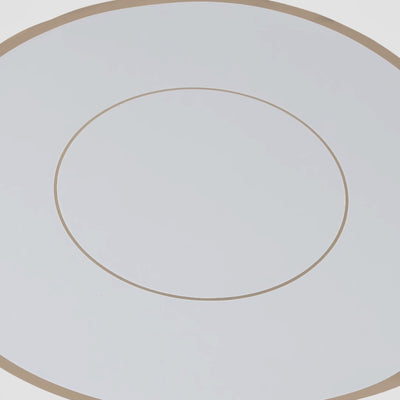 White round disposable table placemat with gold rim.