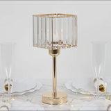 Gold crystal hurricane candle holder with a square design.