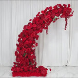 Red floral backdrop for a wedding arch with roses, hydrangeas, and chrysanthemums.