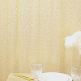 Gold sequin backdrop curtain for events and photo booths.