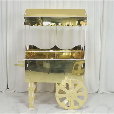 Gold mirrored dessert cart with wheels and shelf for event decor.