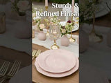 Elegant pink dinner plates with a sturdy and refined finish on a beautifully set table.