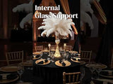 Elegant table setting with internal glass support and feather centerpiece.