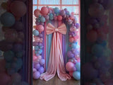 Colorful balloon arch with pink and blue accents for event decoration.