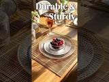 Durable and sturdy table setting with berries in a bowl on a stylish placemat.