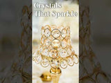 Elegant crystal lamp with golden accents and sparkling details.