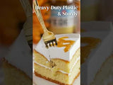 Heavy-duty plastic fork cutting through a layered cake.