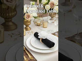 Elegant table setting with refined decor and floral accents.