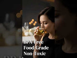 Woman enjoying a drink from a BPA-free, food-grade, non-toxic glass.