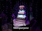 Decorative multi-tier cake stand with elegant design and soft lighting.