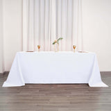 90"x132" White Polyester Rectangular Tablecloth