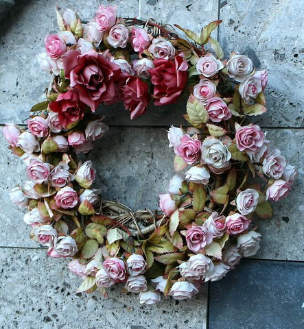 Hanging glass orb with roses