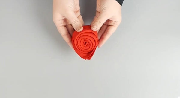 Napkin Folds for Wedding Receptions- rose napkin folding steps