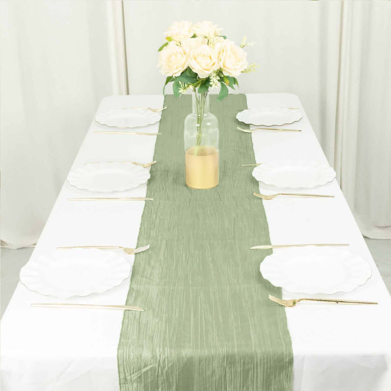 Sage green table runner on a set dining table
