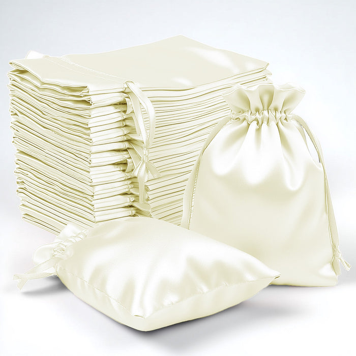 Set of satin drawstring bags in cream color, including various sizes.