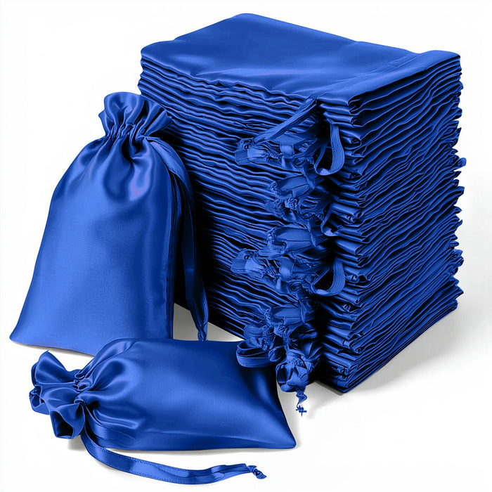 Stack of blue satin drawstring bags on a white background.
